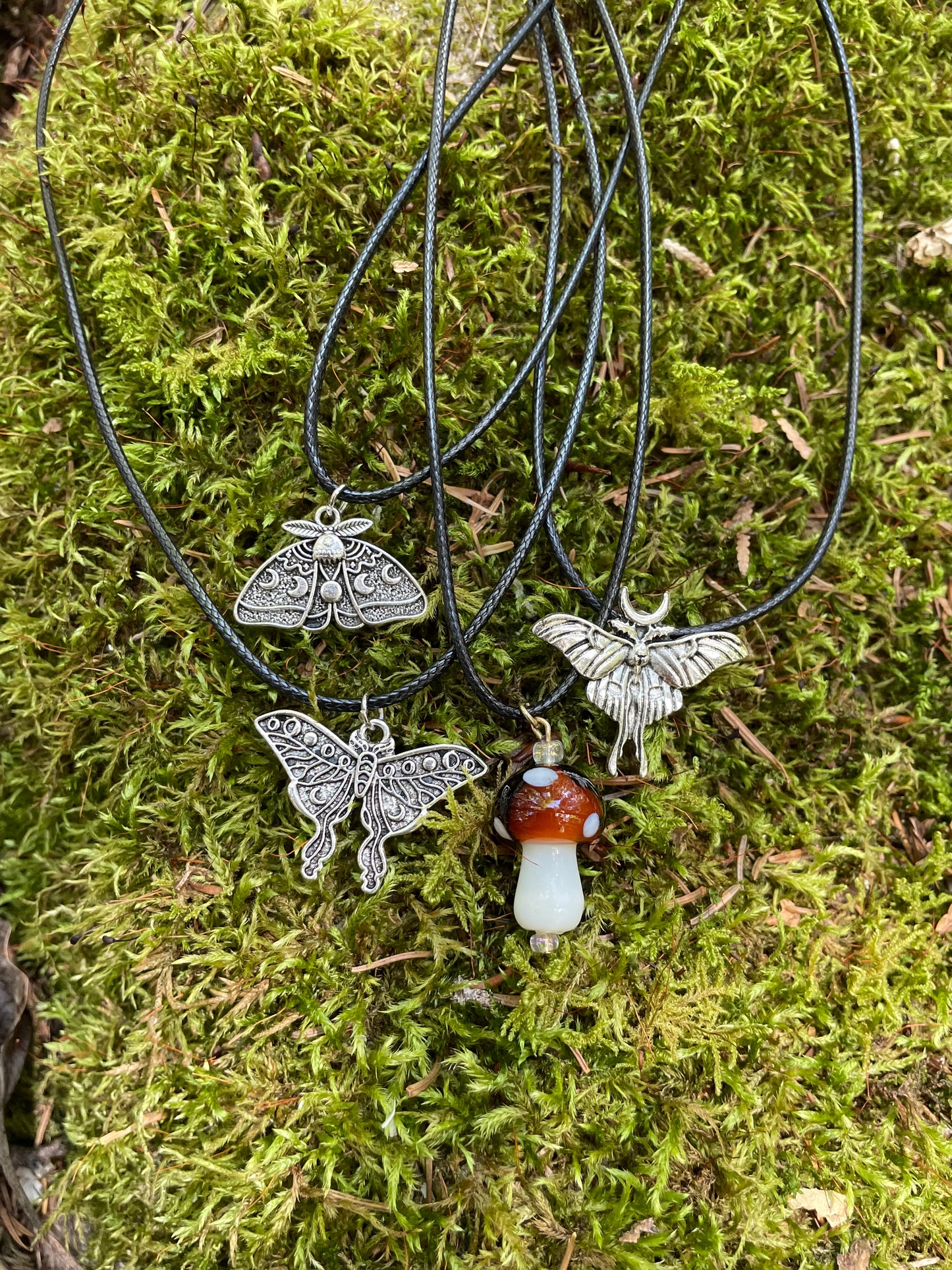 Moth and Mushroom Necklaces